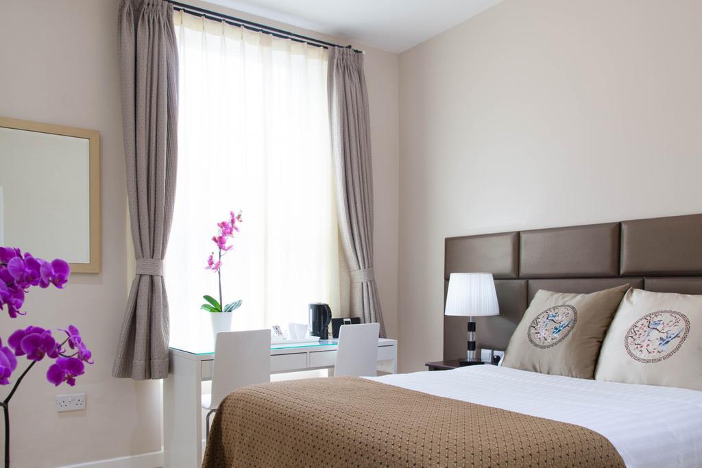 Welcome Inn Victoria London Rum bild